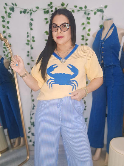 Sweter amarillo detalles azul